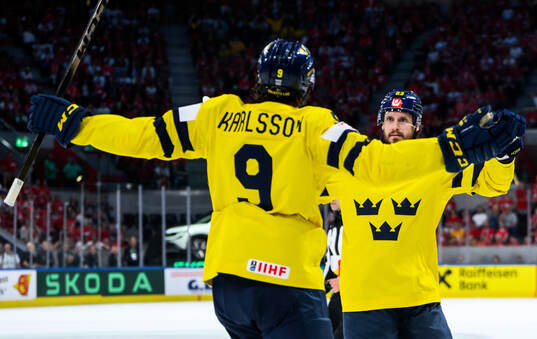 Linus Karlsson and Oliver Ekman-Larsson of Sweden celebrates