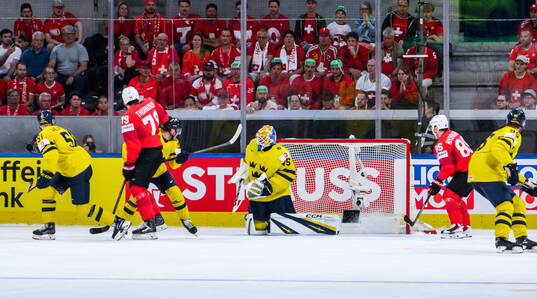 Goaltender Magnus Hellberg of Sweden concedes a goal to 1-1