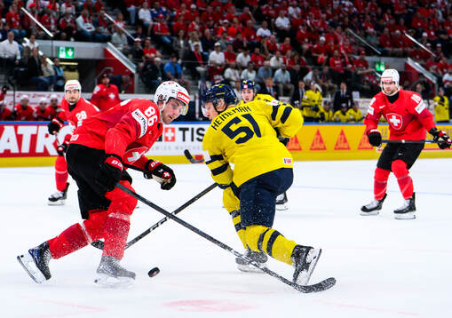 Janis Moser of Switzerland and Emil Heineman of Sweden