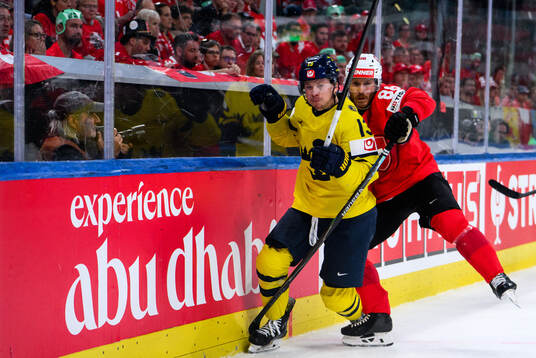 Lucas Raymond of Sweden and Christoph Bertschy of