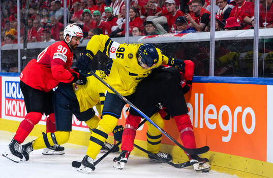 Jacob De La Rose of Sweden and Nico Hischier of Switzerland
