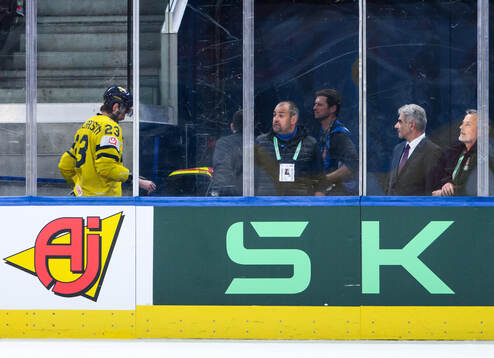 Oliver Ekman-Larsson of Sweden leaves the ice fue to injury