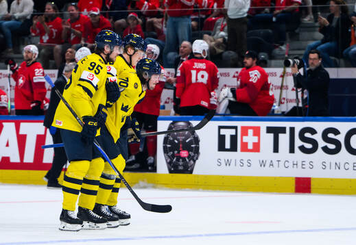 Oscar Sundqvist of Sweden is injured and receives help of
