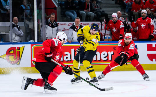 Carl Grundström of Sweden and Timo Meier of Switzerland