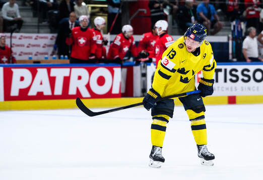 Lucas Raymond of Sweden looks dejected