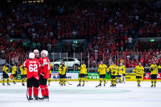 Players of Sweden look dejected