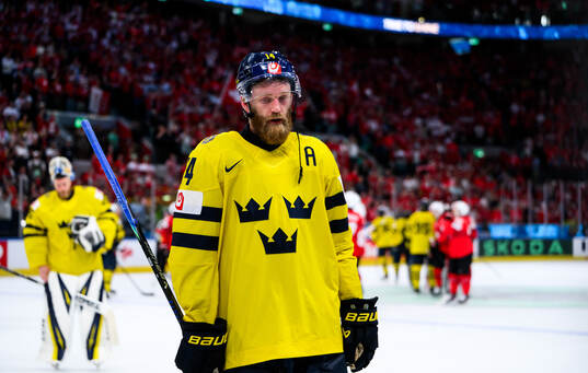 Mattias Ekholm of Sweden looks dejected