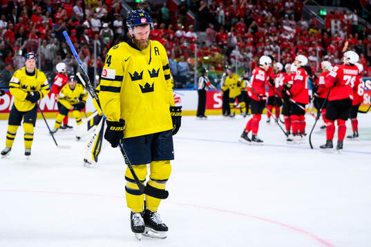 Mattias Ekholm of Sweden looks dejected