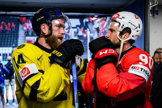 Mattias Ekholm of Sweden and Roman Josi of Switzerland