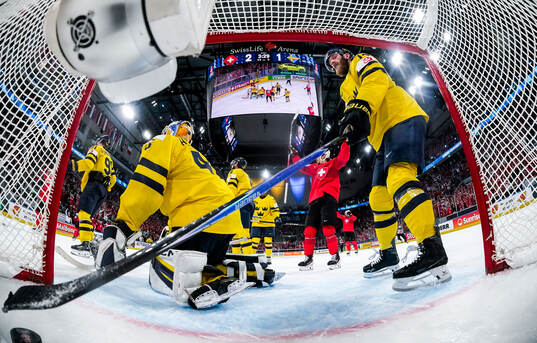 Goaltender Magnus Hellberg and Mattias Ekholm of Sweden