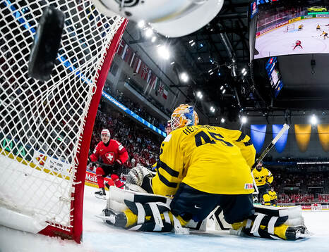 Goaltender Magnus Hellberg of Sweden concedes 2-1