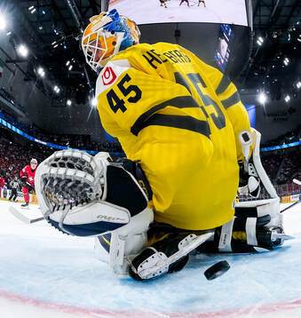 Goaltender Magnus Hellberg of Sweden concedes 3-1