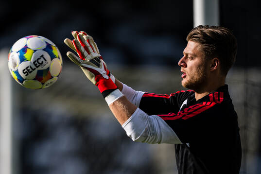 Goalkeeper Rasmus Sandberg of Rosenborg warms up