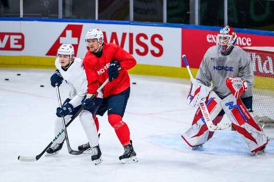 Noah Steen, Max Krogdahl and goaltender Tobias Normann of