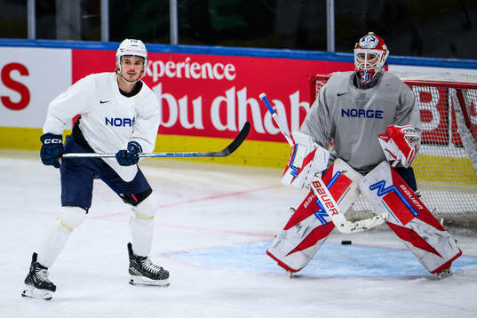 Håvard Østrem Salsten and goaltender Tobias Normann of
