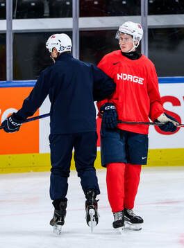 Assistant coach Ole-Kristian Tollefsen and Tinus Luc Koblar