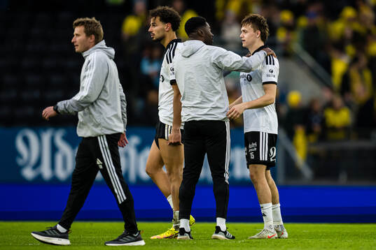 Head coach Alexander Tettey and Jonas Søgaard Mortensen of