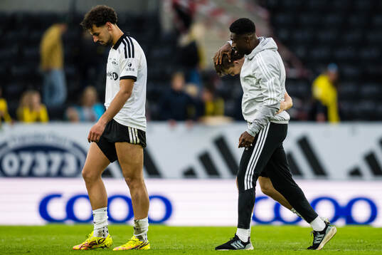Head coach Alexander Tettey and Jonas Søgaard Mortensen of