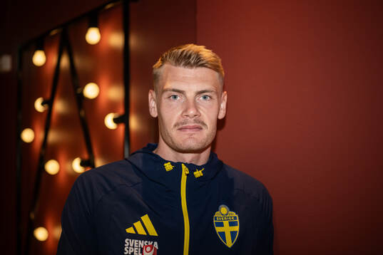Eric Smith of the Swedish national football team poses for
