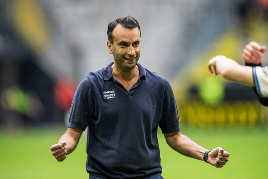 Sirius tränare Andreas Engelmark jublar