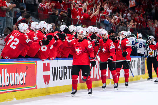 Christoph Bertschy of Switzerland celebrates