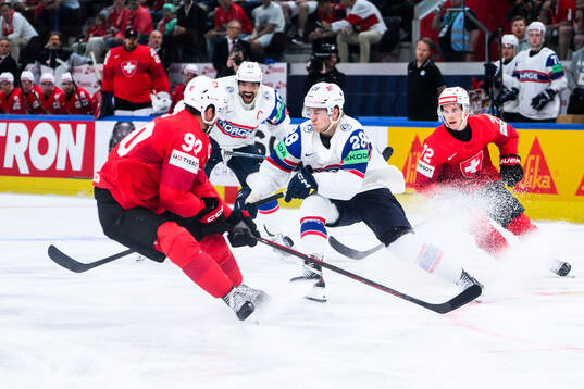 Roman Josi of Switzerland and Michael Brandsegg-Nygård of