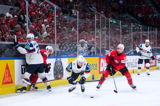 Petter Vesterheim of Norway and Nico Hischier of Switzerland
