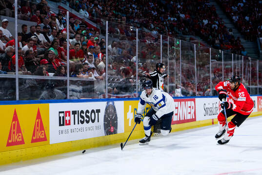 Alexander Barkov of Finland and Darnell Nurse of Canada