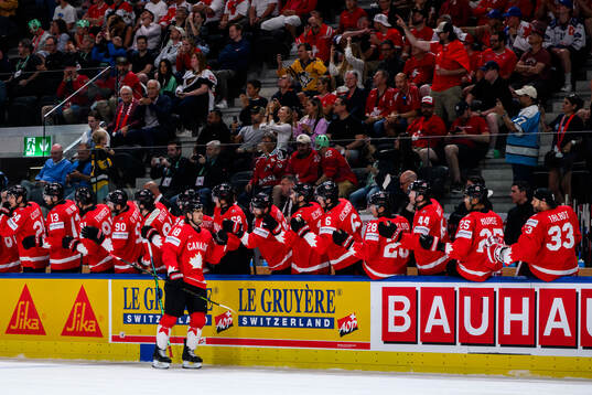 Robert Thomas of Canada celebrating
