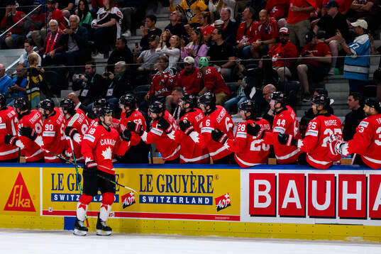 Robert Thomas of Canada celebrating