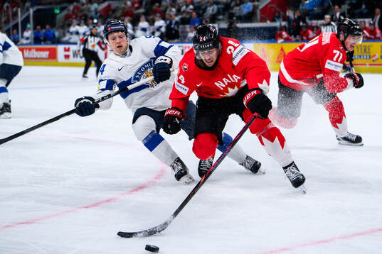 Konsta Helenius of Finland and Dylan Cozens of Canada