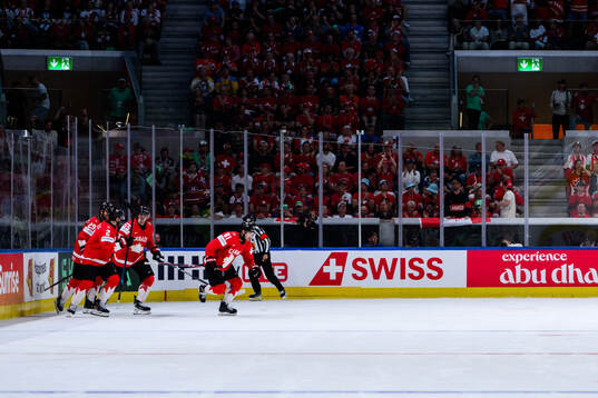 Dylan Holloway of Canada celebrates