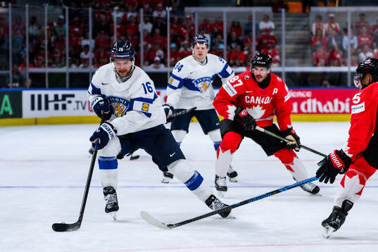 Alexander Barkov of Finland and Sidney Crosby of Canada