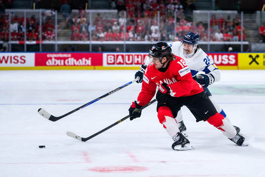 Robert Thomas of Canada and Hannes Björninen of Finland