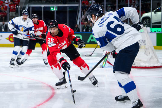 Darnell Nurse of Canada and Mikael Granlund of Finland