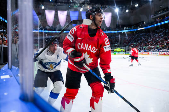 Mikael Granlund of Finland and Darnell Nurse of Canada