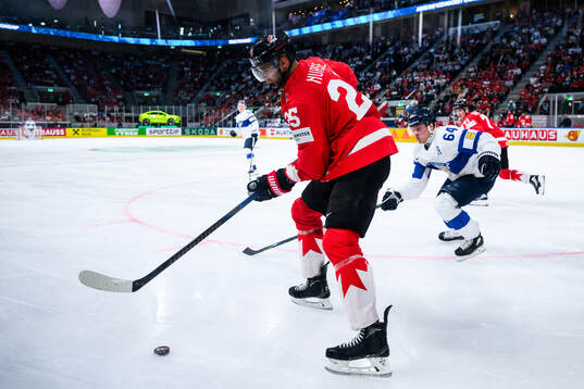 Darnell Nurse of Canada and Mikael Granlund of Finland