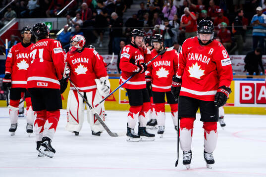 Sidney Crosby of Canada looks dejected