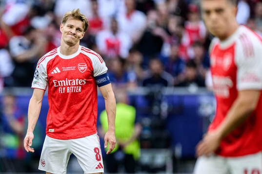 Martin Ødegaard of Arsenal looks dejected