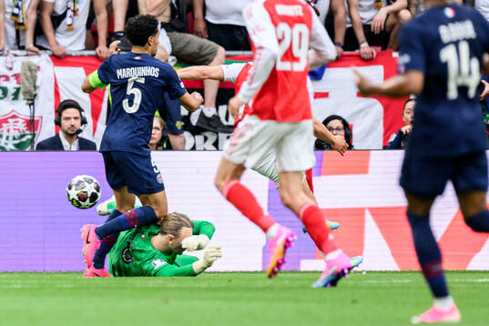 Goalkeeper Matvey Safonov and Marquinhos of Paris