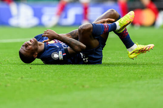 Nuno Mendes of Paris Saint-Germain in pain