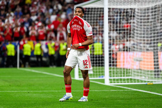Jurrien Timber of Arsenal looks dejected