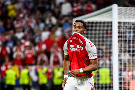 Jurrien Timber of Arsenal looks dejected