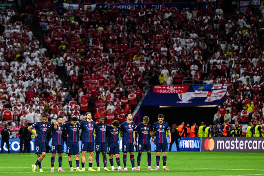 Players of Paris Saint-Germain in a penalty shootout