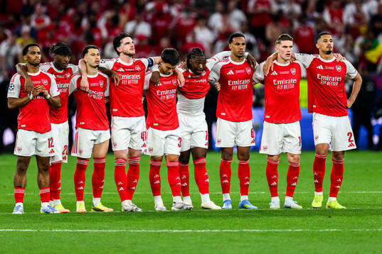 Players of Arsenal in a penalty shootout
