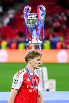 Martin Ødegaard of Arsenal looks dejected