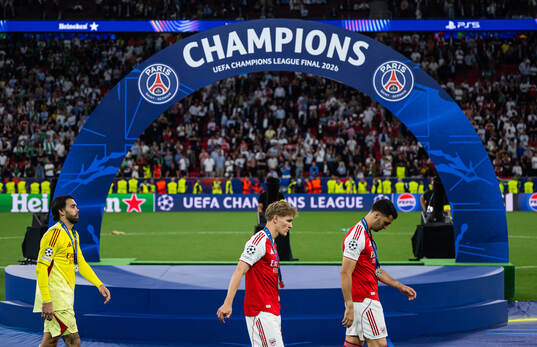 goalkeeper David Raya and Martin Ødegaard of Arsenal look