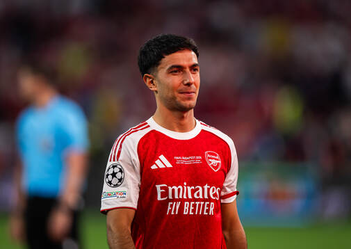 Martin Zubimendi of Arsenal looks dejected