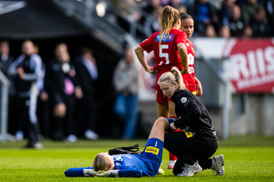 Goalkeeper Klara Thorsrud Sporsem of LSK Kvinner in pain