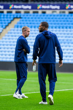 Head coach Graham Potter and Isak Hien of the Swedish